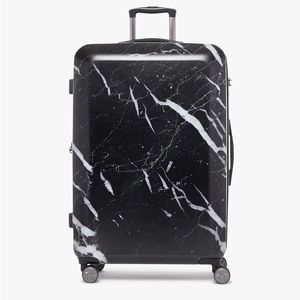 Calpak Astyll Marble Suitcase